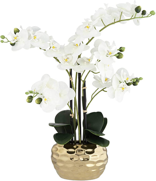 Faux orchid in a gold ceramic pot