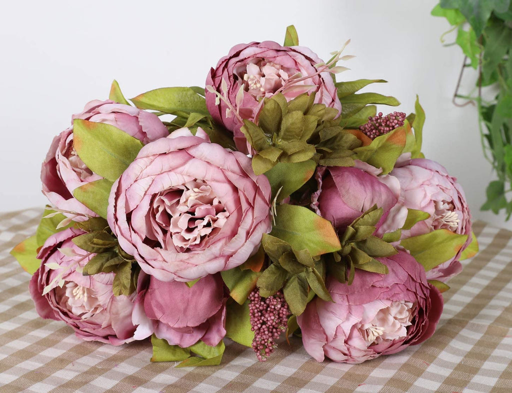 Vintage silk flowers arranged in a vase